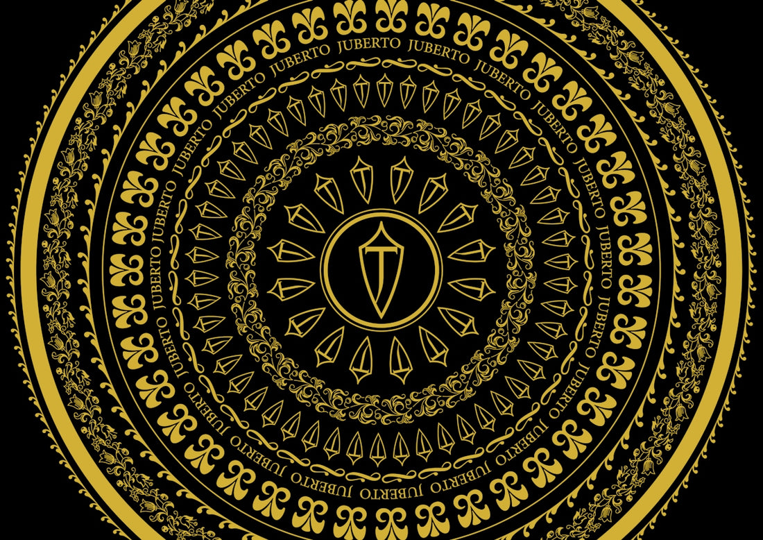 a gold and black circular design on a black background