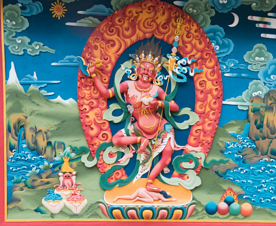 Colorful tibetan thangka painting of a deity