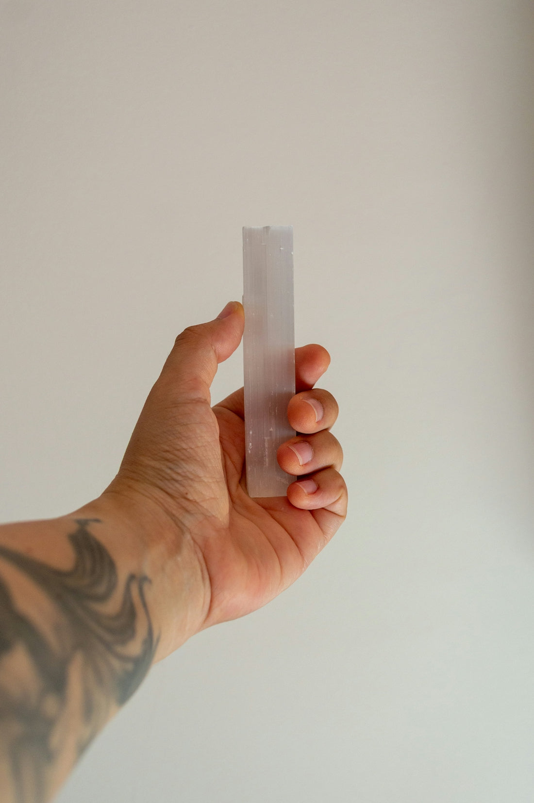 Hand holding a translucent rectangular object
