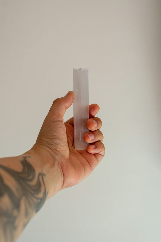 Hand holding a translucent rectangular object